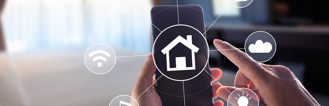 Hands holding a phone; floating icons indicate smart-home related features